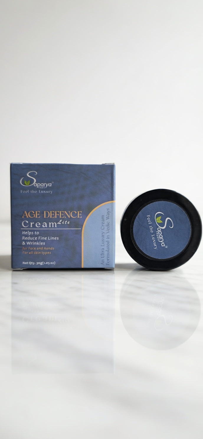 Age Defence Cream packaging with cream container on a white background
