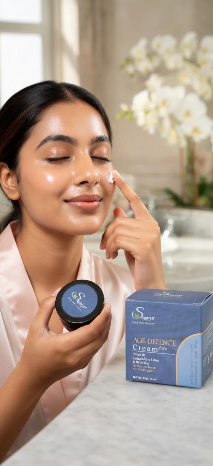 Woman applying cream to her face with a box of 'Age Defence Cream' in the background.